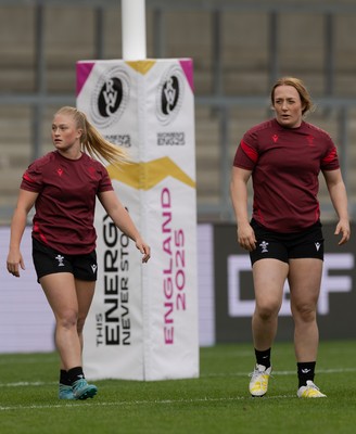 220825 - Wales Women Rugby World Cup Captain’s Run - Wales’ Seren Lockwood and Abbie Fleming during Captain’s Run ahead of their first Women’s Rugby World Cup match against Scotland at the Salford Community Stadium