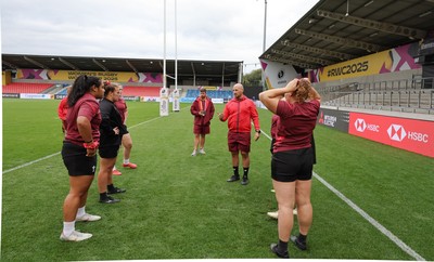220825 - Wales Women Rugby World Cup Captain’s Run - The Wales pack scrum down during Captain’s Run ahead of Wales’ first Women’s Rugby World Cup match against Scotland at the Salford Community Stadium