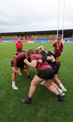 220825 - Wales Women Rugby World Cup Captain’s Run - The Wales pack scrum down during Captain’s Run ahead of Wales’ first Women’s Rugby World Cup match against Scotland at the Salford Community Stadium