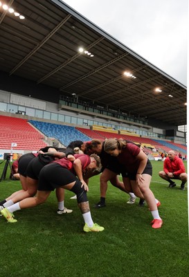 220825 - Wales Women Rugby World Cup Captain’s Run - The Wales pack scrum down during Captain’s Run ahead of Wales’ first Women’s Rugby World Cup match against Scotland at the Salford Community Stadium