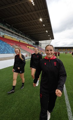 220825 - Wales Women Rugby World Cup Captain’s Run - Hannah Dallavalle, Carys Cox and Jasmine Joyce-Butchers during Captain’s Run ahead of Wales’ first Women’s Rugby World Cup match against Scotland at the Salford Community Stadium