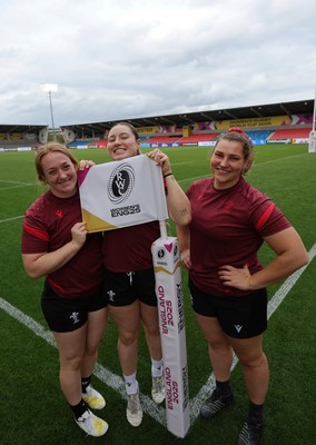 220825 - Wales Women Rugby World Cup Captain’s Run - Abbie Fleming, Gwen Crabb and Gwenllian Pyrs after Captain’s Run ahead of Wales’ first Women’s Rugby World Cup match against Scotland at the Salford Community Stadium