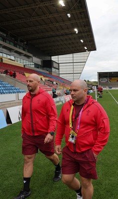 220825 - Wales Women Rugby World Cup Captain’s Run - Mike Hill, Wales Women forwards coach, and Sean Lynn, Wales Women head coach during Captain’s Run ahead of Wales’ first Women’s Rugby World Cup match against Scotland at the Salford Community Stadium