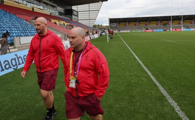 220825 - Wales Women Rugby World Cup Captain’s Run - Mike Hill, Wales Women forwards coach, and Sean Lynn, Wales Women head coach during Captain’s Run ahead of Wales’ first Women’s Rugby World Cup match against Scotland at the Salford Community Stadium