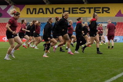220825 - Wales Women Rugby World Cup Captain’s Run - The Wales team warm up during Captain’s Run ahead of Wales’ first Women’s Rugby World Cup match against Scotland at the Salford Community Stadium