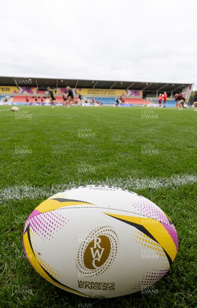220825 - Wales Women Rugby World Cup Captain’s Run - A Rugby World Cup ball on the  pitch during Captain’s Run ahead of their first Women’s Rugby World Cup match against Scotland at the Salford Community Stadium