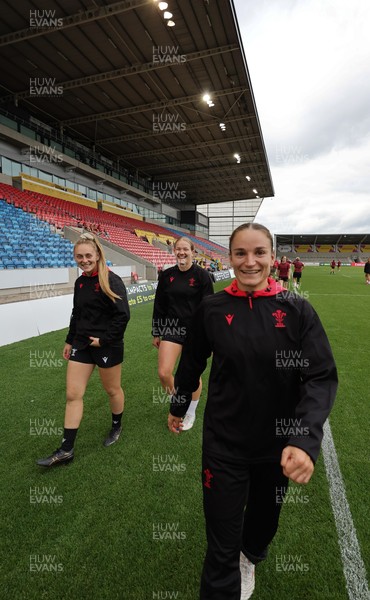 220825 - Wales Women Rugby World Cup Captain’s Run - Hannah Dallavalle, Carys Cox and Jasmine Joyce-Butchers during Captain’s Run ahead of Wales’ first Women’s Rugby World Cup match against Scotland at the Salford Community Stadium