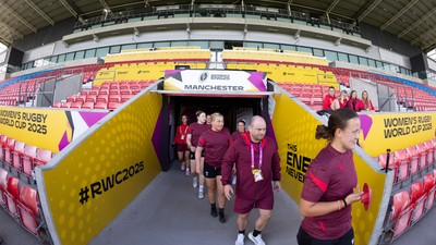 290825 - Wales Women Rugby World Cup Captain’s Run - The Wales squad make their way to the pitch at Salford Community Stadium for Captain’s Run ahead of the Rugby World Cup match against Canada
