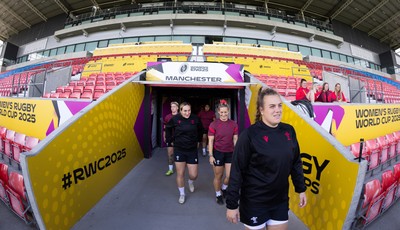 290825 - Wales Women Rugby World Cup Captain’s Run - The Wales squad make their way to the pitch at Salford Community Stadium for Captain’s Run ahead of the Rugby World Cup match against Canada