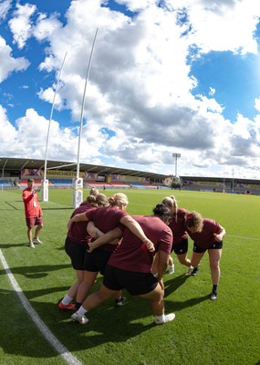 290825 - Wales Women Rugby World Cup Captain’s Run -The Wales squad scrummage during Captain’s Run ahead of the Rugby World Cup match against Canada