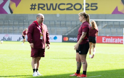290825 - Wales Women Rugby World Cup Captain’s Run -Sean Lynn, Wales Women head coach with Bethan Lewis of Wales during Captain’s Run ahead of the Rugby World Cup match against Canada