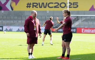 290825 - Wales Women Rugby World Cup Captain’s Run -Sean Lynn, Wales Women head coach with Bethan Lewis of Wales during Captain’s Run ahead of the Rugby World Cup match against Canada