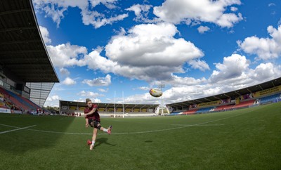 290825 - Wales Women Rugby World Cup Captain’s Run - Keira Bevan of Wales goes through kicking practice during Captain’s Run ahead of the Rugby World Cup match against Canada