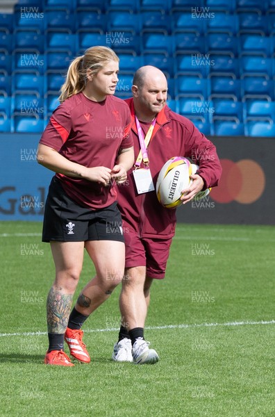 290825 - Wales Women Rugby World Cup Captain’s Run - Bethan Lewis of Wales and Sean Lynn, Wales Women head coach during Captain’s Run ahead of the Rugby World Cup match against Canada