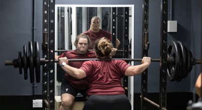 020925 - Wales Women Gym Session - Abbey Constable is watched by Kelsey Jones  during a gym training session ahead of their final Women’s Rugby World Cup match against Fiji