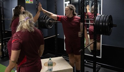 020925 - Wales Women Gym Session - Maisie Davies with Bryonie King and Alex Callender during a gym training session ahead of their final Women’s Rugby World Cup match against Fiji