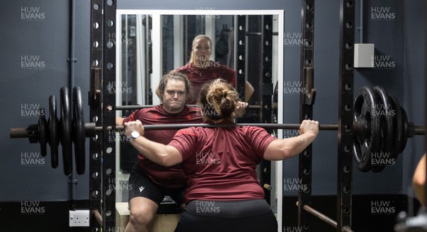 020925 - Wales Women Gym Session - Abbey Constable is watched by Kelsey Jones  during a gym training session ahead of their final Women’s Rugby World Cup match against Fiji