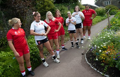150725 - Wales Women Women’s Rugby World Cup 2025 Kit Launch, National Botanical Gardens of Wales - Wales players Molly Reardon, Georgia Evans, Alex Callender, Kate Williams, Keira Bevan, Maisie Davies and Sisilia Tuipulotu at the launch of the Wales Women’s Rugby World Cup kit at the National Botanical Gardens of Wales