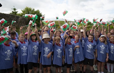 150725 - Wales Women Women’s Rugby World Cup 2025 Kit Launch, National Botanical Gardens of Wales - Schoolchildren sing at the kit launch