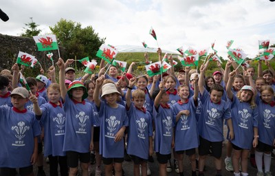 150725 - Wales Women Women’s Rugby World Cup 2025 Kit Launch, National Botanical Gardens of Wales - Schoolchildren sing at the kit launch