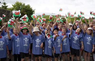 150725 - Wales Women Women’s Rugby World Cup 2025 Kit Launch, National Botanical Gardens of Wales - Schoolchildren sing at the kit launch