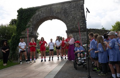 150725 - Wales Women Women’s Rugby World Cup 2025 Kit Launch, National Botanical Gardens of Wales - Wales players Georgia Evans, Alex Callender, Kate Williams, Keira Beva, Maisie Davies, Molly Reardon ands Sisilia Tuipulotu at the launch of the Wales Women’s Rugby World Cup kit at the National Botanical Gardens of Wales
