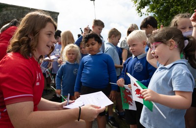 150725 - Wales Women Women’s Rugby World Cup 2025 Kit Launch, National Botanical Gardens of Wales - Kate Williams with schoolchildren at the launch of the Wales Women’s Rugby World Cup kit at the National Botanical Gardens of Wales