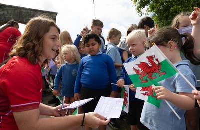 150725 - Wales Women Women’s Rugby World Cup 2025 Kit Launch, National Botanical Gardens of Wales - Kate Williams with schoolchildren at the launch of the Wales Women’s Rugby World Cup kit at the National Botanical Gardens of Wales