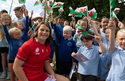 150725 - Wales Women Women’s Rugby World Cup 2025 Kit Launch, National Botanical Gardens of Wales - Kate Williams with schoolchildren at the launch of the Wales Women’s Rugby World Cup kit at the National Botanical Gardens of Wales