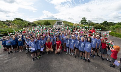 150725 - Wales Women Women’s Rugby World Cup 2025 Kit Launch, National Botanical Gardens of Wales - Wales players, join with schoolchildren at the launch of the Wales Women’s Rugby World Cup kit at the National Botanical Gardens of Wales