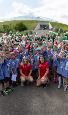 150725 - Wales Women Women’s Rugby World Cup 2025 Kit Launch, National Botanical Gardens of Wales - Wales players, join with schoolchildren at the launch of the Wales Women’s Rugby World Cup kit at the National Botanical Gardens of Wales
