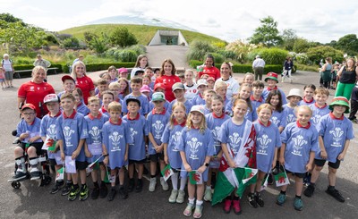 150725 - Wales Women Women’s Rugby World Cup 2025 Kit Launch, National Botanical Gardens of Wales - Wales players, join with schoolchildren at the launch of the Wales Women’s Rugby World Cup kit at the National Botanical Gardens of Wales