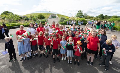 150725 - Wales Women Women’s Rugby World Cup 2025 Kit Launch, National Botanical Gardens of Wales - Wales players, join with schoolchildren at the launch of the Wales Women’s Rugby World Cup kit at the National Botanical Gardens of Wales