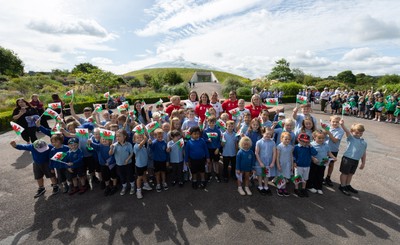 150725 - Wales Women Women’s Rugby World Cup 2025 Kit Launch, National Botanical Gardens of Wales - Wales players, join with schoolchildren at the launch of the Wales Women’s Rugby World Cup kit at the National Botanical Gardens of Wales