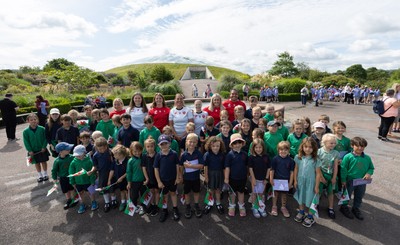 150725 - Wales Women Women’s Rugby World Cup 2025 Kit Launch, National Botanical Gardens of Wales - Wales players, join with schoolchildren at the launch of the Wales Women’s Rugby World Cup kit at the National Botanical Gardens of Wales