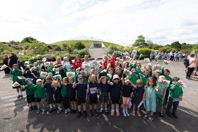 150725 - Wales Women Women’s Rugby World Cup 2025 Kit Launch, National Botanical Gardens of Wales - Wales players, join with schoolchildren at the launch of the Wales Women’s Rugby World Cup kit at the National Botanical Gardens of Wales