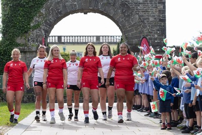 150725 - Wales Women Women’s Rugby World Cup 2025 Kit Launch, National Botanical Gardens of Wales - Wales players, left to right, Molly Reardon, Georgia Evans, Alex Callender, Keira Bevan, Kate Williams, Maisie Davies and Sisilia Tuipulotu at the launch of the Wales Women’s Rugby World Cup kit