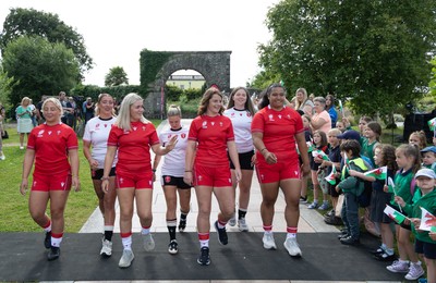 150725 - Wales Women Women’s Rugby World Cup 2025 Kit Launch, National Botanical Gardens of Wales - Wales players, left to right, Molly Reardon, Georgia Evans, Alex Callender, Keira Bevan, Kate Williams, Maisie Davies and Sisilia Tuipulotu at the launch of the Wales Women’s Rugby World Cup kit