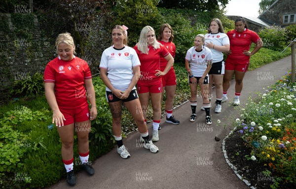 150725 - Wales Women Women’s Rugby World Cup 2025 Kit Launch, National Botanical Gardens of Wales - Wales players Molly Reardon, Georgia Evans, Alex Callender, Kate Williams, Keira Bevan, Maisie Davies and Sisilia Tuipulotu at the launch of the Wales Women’s Rugby World Cup kit at the National Botanical Gardens of Wales
