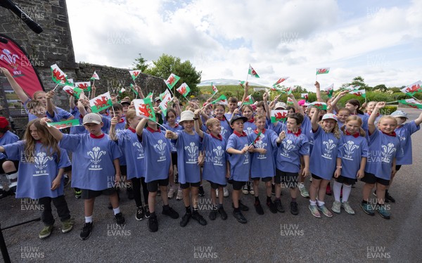 150725 - Wales Women Women’s Rugby World Cup 2025 Kit Launch, National Botanical Gardens of Wales - Schoolchildren sing at the kit launch