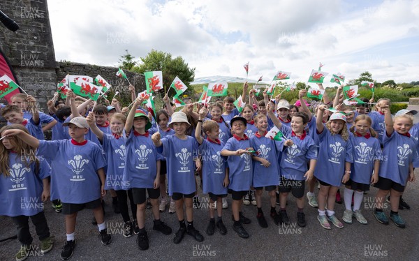 150725 - Wales Women Women’s Rugby World Cup 2025 Kit Launch, National Botanical Gardens of Wales - Schoolchildren sing at the kit launch