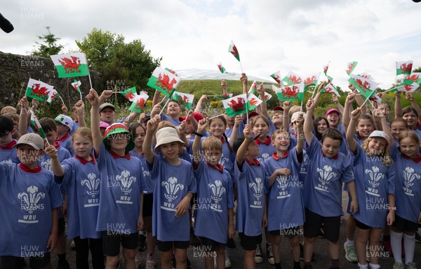 150725 - Wales Women Women’s Rugby World Cup 2025 Kit Launch, National Botanical Gardens of Wales - Schoolchildren sing at the kit launch