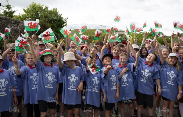 150725 - Wales Women Women’s Rugby World Cup 2025 Kit Launch, National Botanical Gardens of Wales - Schoolchildren sing at the kit launch
