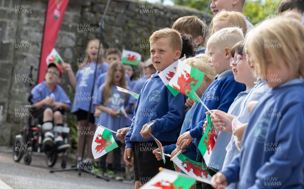150725 - Wales Women Women’s Rugby World Cup 2025 Kit Launch, National Botanical Gardens of Wales - Schoolchildren sing at the kit launch