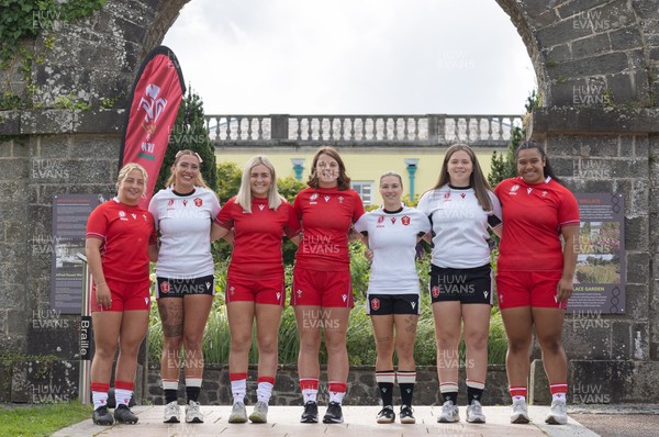 150725 - Wales Women Women’s Rugby World Cup 2025 Kit Launch, National Botanical Gardens of Wales - Wales players, left to right, Molly Reardon, Georgia Evans, Alex Callender, Kate Williams, Keira Bevan, Maisie Davies and Sisilia Tuipulotu at the launch of the Wales Women’s Rugby World Cup kit