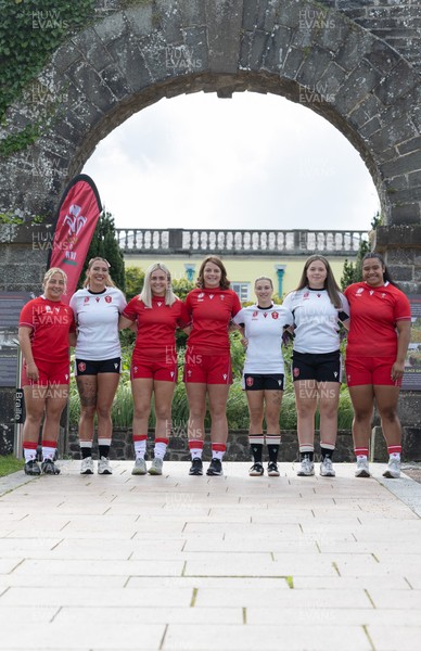 150725 - Wales Women Women’s Rugby World Cup 2025 Kit Launch, National Botanical Gardens of Wales - Wales players, left to right, Molly Reardon, Georgia Evans, Alex Callender, Kate Williams, Keira Bevan,  Maisie Davies and Sisilia Tuipulotu at the launch of the Wales Women’s Rugby World Cup kit