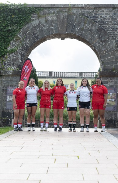 150725 - Wales Women Women’s Rugby World Cup 2025 Kit Launch, National Botanical Gardens of Wales - Wales players, left to right, Molly Reardon, Georgia Evans, Alex Callender, Kate Williams, Keira Bevan Maisie Davies and Sisilia Tuipulotu at the launch of the Wales Women’s Rugby World Cup kit