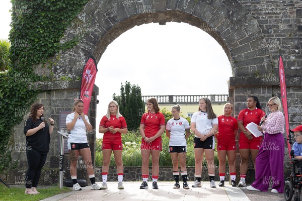 150725 - Wales Women Women’s Rugby World Cup 2025 Kit Launch, National Botanical Gardens of Wales - Wales players Georgia Evans, Alex Callender, Kate Williams, Keira Beva, Maisie Davies, Molly Reardon ands Sisilia Tuipulotu at the launch of the Wales Women’s Rugby World Cup kit at the National Botanical Gardens of Wales