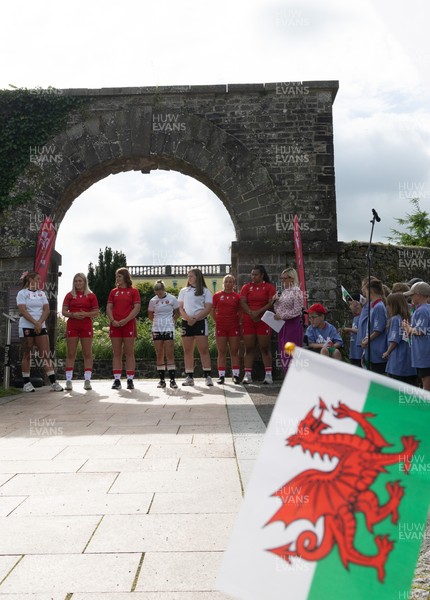 150725 - Wales Women Women’s Rugby World Cup 2025 Kit Launch, National Botanical Gardens of Wales - Wales players Georgia Evans, Alex Callender, Kate Williams, Keira Beva, Maisie Davies, Molly Reardon ands Sisilia Tuipulotu at the launch of the Wales Women’s Rugby World Cup kit at the National Botanical Gardens of Wales