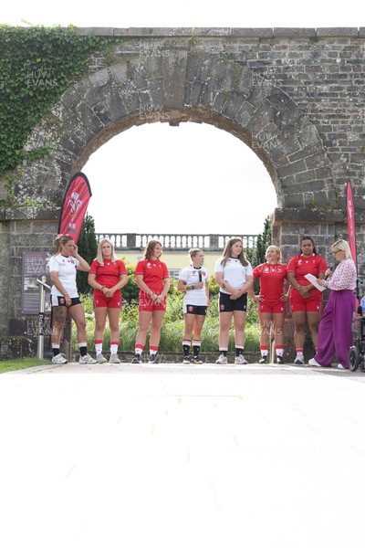 150725 - Wales Women Women’s Rugby World Cup 2025 Kit Launch, National Botanical Gardens of Wales - Wales players Georgia Evans, Alex Callender, Kate Williams, Keira Beva, Maisie Davies, Molly Reardon ands Sisilia Tuipulotu at the launch of the Wales Women’s Rugby World Cup kit at the National Botanical Gardens of Wales